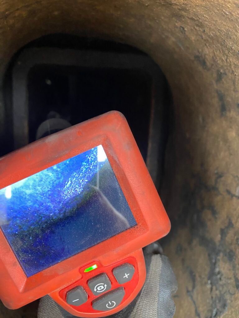 Chimney inspection camera looking down chimney flue