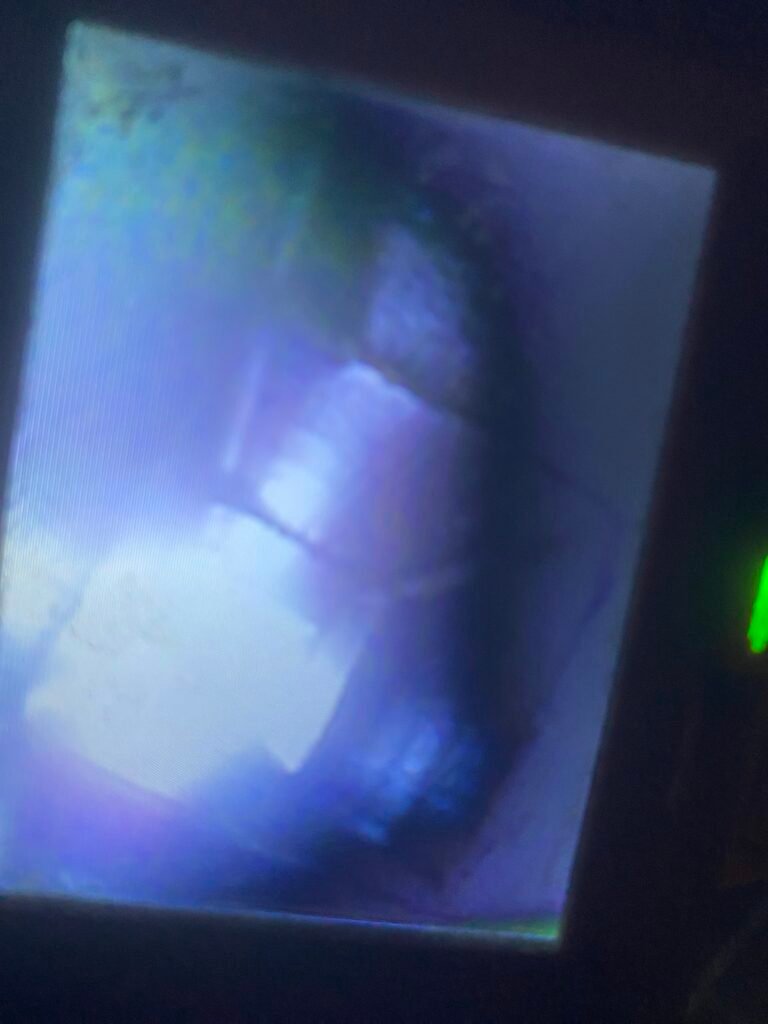 Camera inspection looking up a clay chimney flue