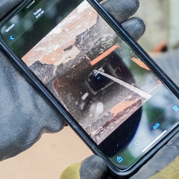 Camera inspection of chimney flue interior