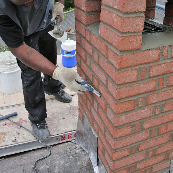 Tuckpointing repair restoring chimney mortar joints