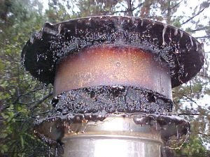 Creosote buildup inside chimney flue in South Bend IN showing dangerous stage 3 glazed creosote